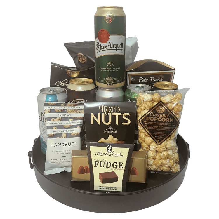 Beer gift basket with six international beers, pretzels, nuts, chips, and gourmet snacks, unwrapped on black tray