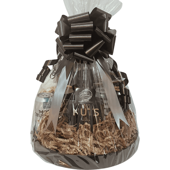 Beer gift basket with six international beers, pretzels, nuts, chips, and gourmet snacks, wrapped and arranged for delivery in Calgary