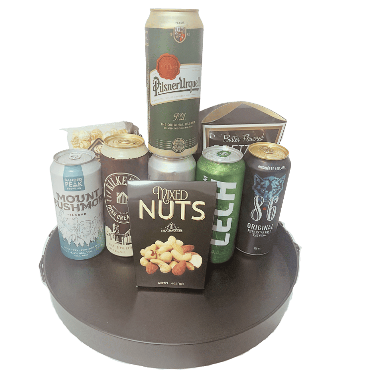 Beer gift basket with six international beers, pretzels, nuts, chips, and gourmet snacks, unwrapped and arranged for delivery in Calgary