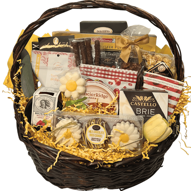 A bright, cheerful gift basket including cheese, chocolate, crackers, popcorn, and candy, all displayed in a large wicker basket.