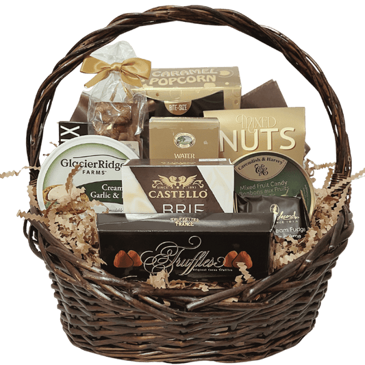 The Gourmet Feast Gift Basket filled with cheese, crackers, truffles, nuts, and cookies, elegantly displayed in a wicker basket to show contents