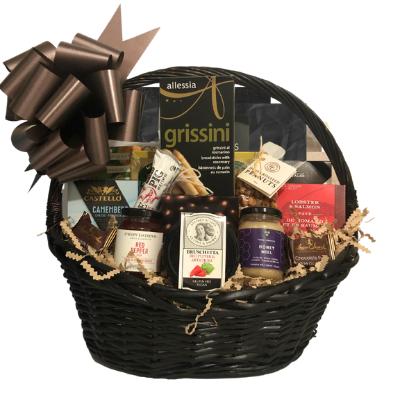 Gourmet gift basket with smoked salmon, cheese, chocolate, and artisan treats