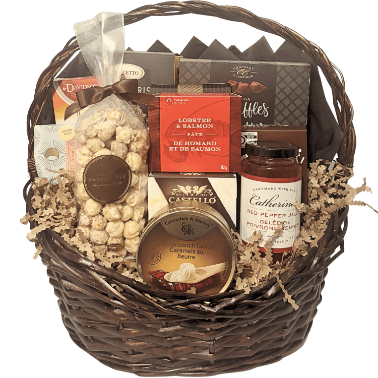 Luxury gourmet gift basket featuring artisan Canadian cheeses, smoked salmon pâté, handcrafted chocolates, gourmet crackers, specialty coffee, premium tea, popcorn, preserves, and entertaining favourites, beautifully presented for local Calgary gift delivery.