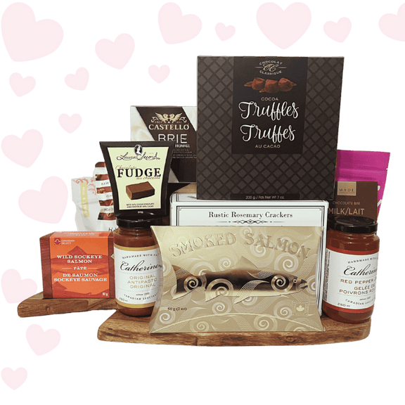 Love at First Bite Valentine’s charcuterie gift basket with gourmet crackers, brie cheese, chocolates, salmon, and sweet treats, beautifully packaged for Valentine’s Day