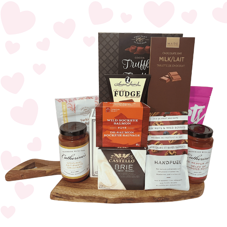 Love at First Bite Valentine’s charcuterie gift basket with gourmet crackers, brie cheese, chocolates, salmon, and sweet treats, beautifully packaged for Valentine’s Day