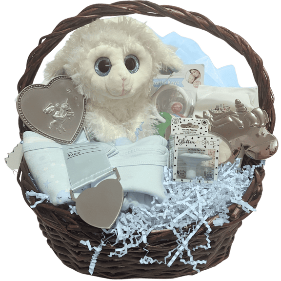 Unwrapped view: blue basket contents displayed including plush lamb, bodysuits, rattle, pacifier, wipes, frame, and growth chart