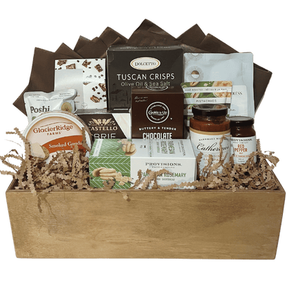 Calgary gourmet gift crate in a locally made wooden box, filled with artisan cheeses, crackers, chocolates, nuts, and Canadian-made gourmet treats