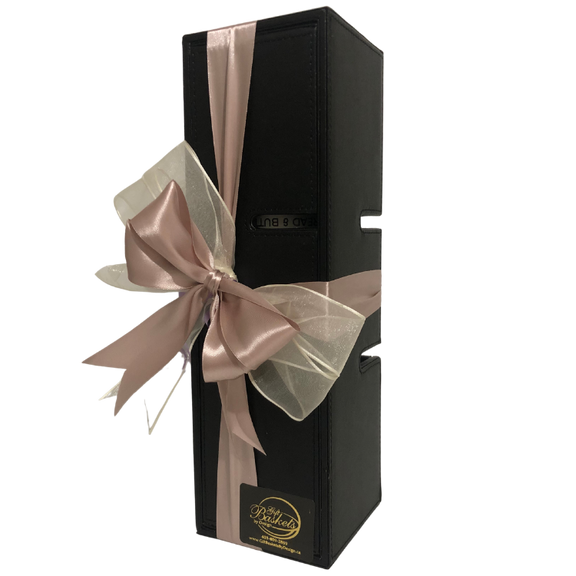 The Uptown Vintage Wine Box combines elegance and function with a premium wine of your choice in a refined leather case that transforms into a wine rack. Perfect Calgary corporate or everyday gift.