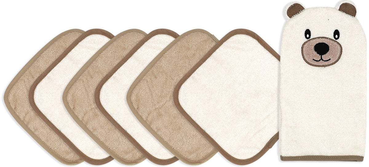 Unboxed Ivory Bear baby washcloth gift set — includes soft ivory bear mitt and six cream-coloured washcloths shown in full.