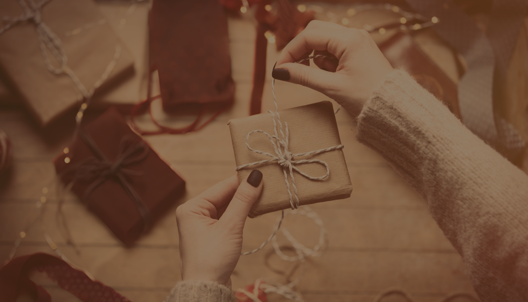 Premium corporate gift basket packaging with ribbon, wrapped by hand in Calgary